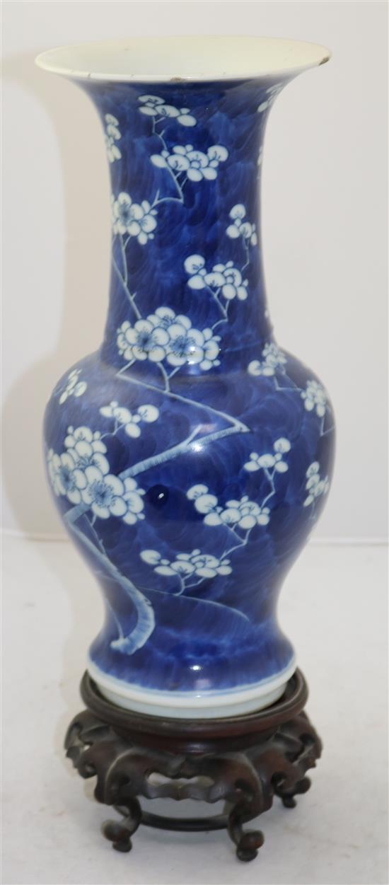 A Chinese blue and white yen yen vase, Kangxi mark, c.1900, 35cm, rosewood stand